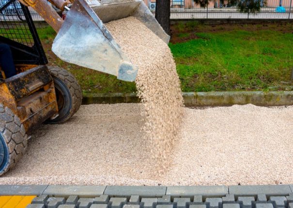 Applying Pebbles for Under Construction Road — All Your Landscaping Supplies in Dubbo, NSW